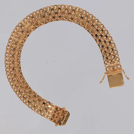 Armband X-länk längd 19cm, bredd 11mm, graverat lås, Stockholm år 1963, 18K Vikt: 22,7 g
