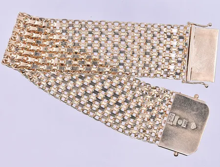 Armband X-länk längd 19 cm bredd 25 mm 18K. Vikt: 51,2 g