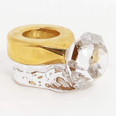 Ljuslykta Kosta Boda Make Up Ring Åsa Ljungnelius, höjd ca 6cm, klarglas samt handmålad, längd 12cm, etikettmärkt. Skickas med postpaket.