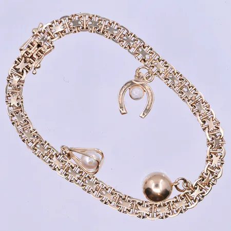 Armband X-länk med 3 berlocker längd 19 cm bredd 5 mm 18K. Vikt: 12,9 g