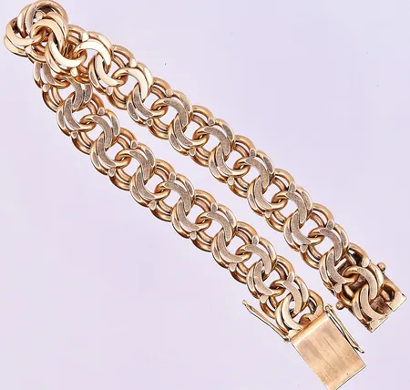 Armband Bismarck längd 19,5 cm bredd 11 mm 18K. Vikt: 47,9 g