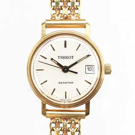 Damur Tissot Seastar 18K, Ø22mm, quartz, klockband X-länk 18K, längd inklusive ur 16,5cm, bredd 9,3mm, gravyr "för nit och redlighet i rikets tjänst", batteribyte krävs, ej funktionstestad, inga tillbehör, bruttovikt 23,8g.