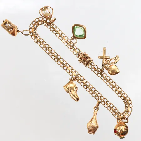 Armband X-länk, med 7 berlocker, längd 20cm, bredd 5,2mm, 18K. Vikt: 15,7 g