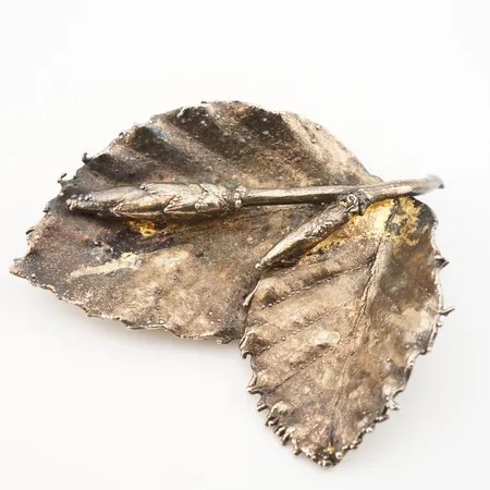 Brosch silver, 60x50mm Vikt: 15,7 g på auktion i Helsingborg hos Pantbanken Sverige