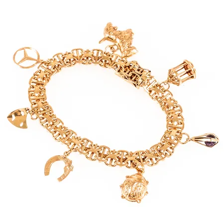 Armband X-länk med sju berlocker längd 19cm bredd 8mm, ojämnheter/defekter på ett par berlocker, 18K 26,6g. 