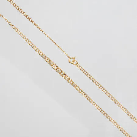 Collier, doserad Bismarck, längd: 41,8cm, bredd: 2,8-4,3mm, diamanter 5 x ca.0,005ct, 8/8-slipade, fattningar i vitguld, svenska stämplar, 18K Vikt: 5,4 g