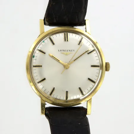 Herrur Longines Ø33mm, manuell, läderband slitet, 18K i boett
