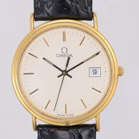 Herrur Omega 18K Ø32,5mm, Quartz står still, gravyr, läderband, etui och instruktionsbok färgbortfall  