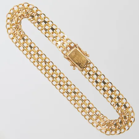 Armband, X-länk, längd: 18,5cm, bredd: 7,6mm, svenska stämplar, 18K Vikt: 8,1 g