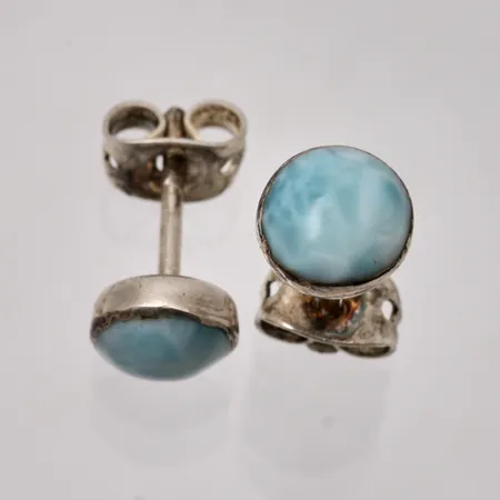 1par örhänge  i silver, mått Ø7mm, 1st ljusblå sten, mått Ø6,6mm, 925/1000, snurrebussar är oäkta, vikt 1,34g.