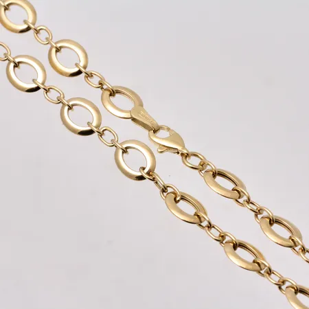  Collier i 18K guld, 44,5cm, ihålig, bredd 6,6mm, tillverkad av Guldfynd, vikt 7,04g.