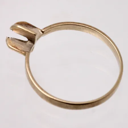 Defekt guld, 18K, vikt 1,65g.
