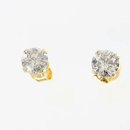 Ett par örhängen diamanter 2 x ca 0,25ct piqué, Ø5mm, 14K Vikt: 0,6 g
