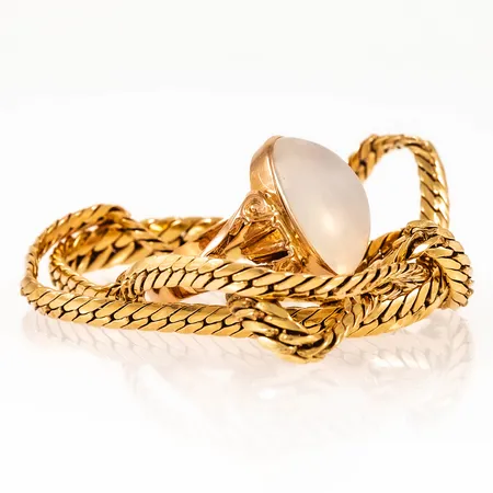 Diverse defekt guld i 18K. Vikt: 14,2g.