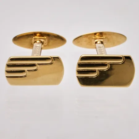 Manschettknappar i 18K guld, mått 9,5x15,2mm, vikt 6g.