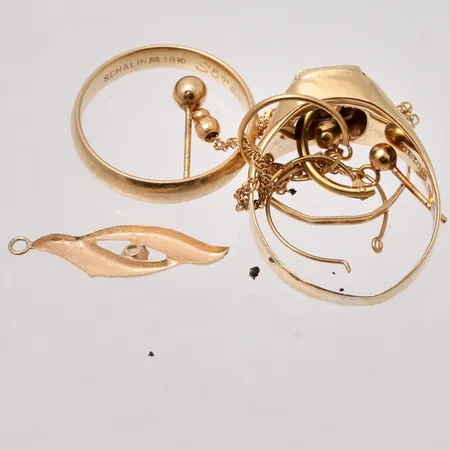 Diverse defekt guld, 18K, vikt 9,54g.