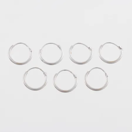 Örhängen 7 st vitguld 18k, diameter ca 12.5 mm. Vikt: 1,2 g