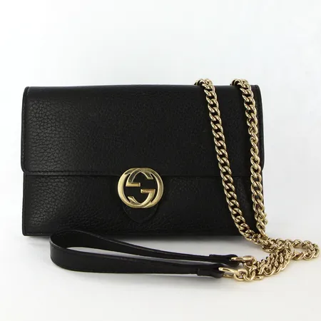 Kuvertväska Gucci Interlocking, svart läder, 12x19cm, detaljer i gulmetall, repig cclogga,  innerficka med dragkedja, kortfack, inga övriga tillbehör