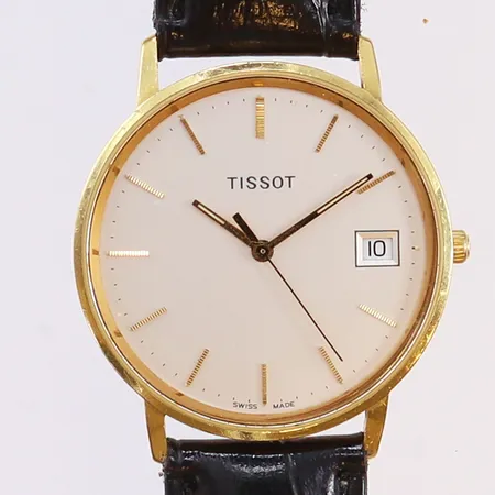Herrur Tissot, 18K, quartz, Ø33mm, skinnarmband defekt 24cm, gravyr