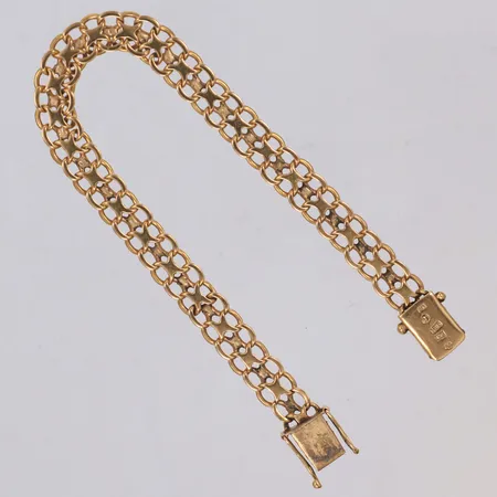 Armband, x-länk, längd 19,5cm, bredd 6,8mm, 18K Vikt: 15 g