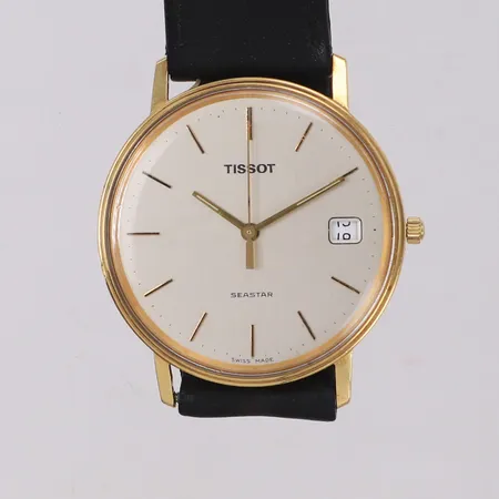 Herrur Tissot Seastar Ø34mm, quartz, datum, repigt glas, 18K gravyr, svart läderband.   Vikt: 0 g