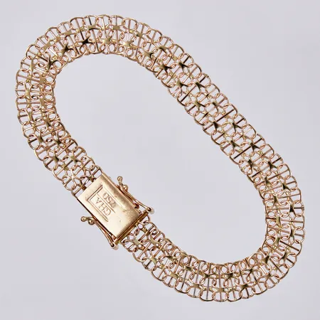 Armband X-länk med stav GHA längd ca 19,2cm, bredd ca 9mm, 18K Vikt: 10,5 g