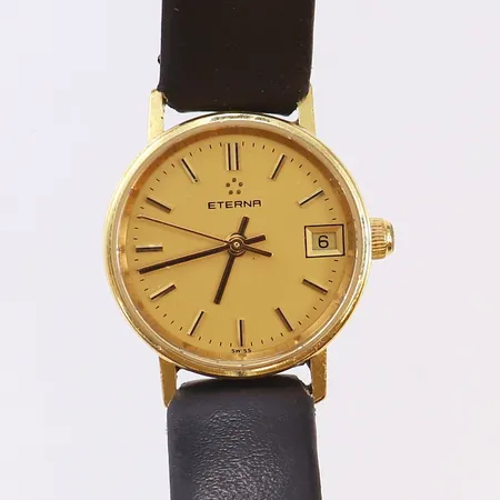 Damur Eterna, 18K, quartz datum, svart läderband, gravyr, går ej, 18K bruttovikt: 14,3g 