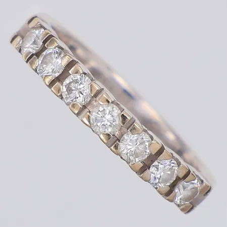 Ring diamanter 7 x ca 0,05ct, stl 17¼, vitguld, 18K Vikt: 4,3 g