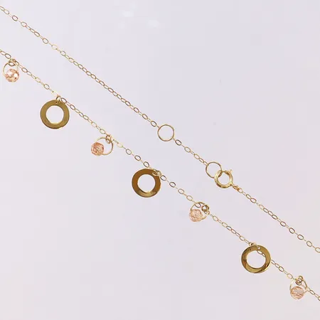 Collier med integrerade hängen, längd 36-38cm, bredd 0,5-6,5mm, 18K. Vikt: 1,4 g