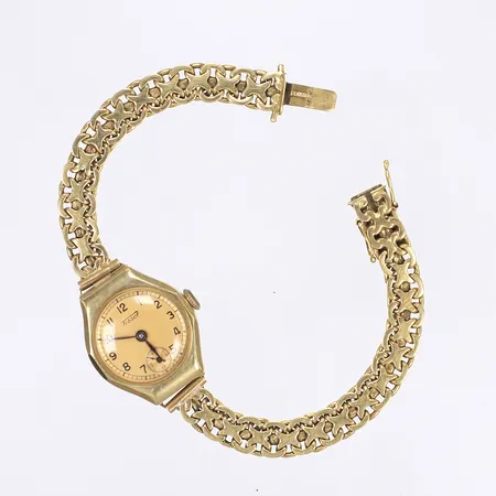 Damur Tissot Ø21mm, länk 17,5cm, gravyr, boett i 14K länk i 18K Bruttovikt: 25,4g