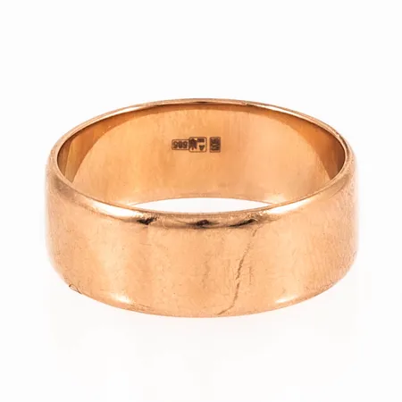 Slät ring i 14K guld. Den är i storlek 17¼, är 6,5 mm bred och väger 4,3g.