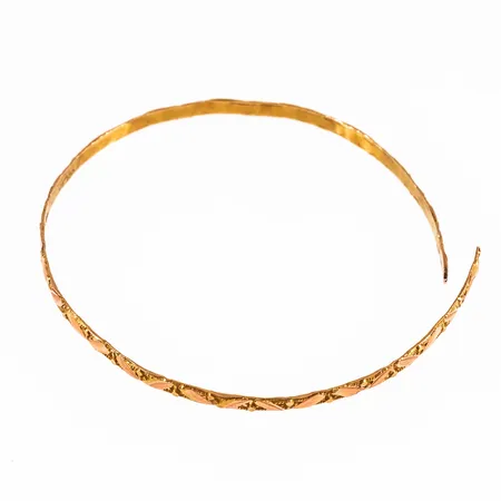 Defekt armring i 705/1000 guld. Vikt: 4,7g.