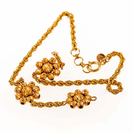 Defekt armband i 21K guld. Vikt: 2,6g.