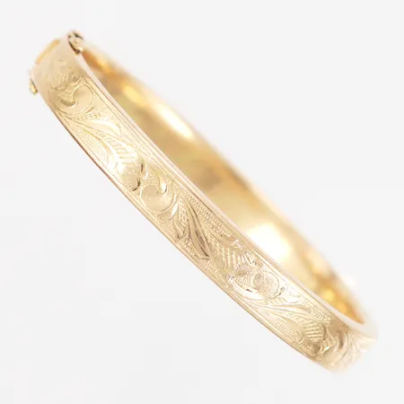 Armring med mönstrad dekor Ø6,5mm, bredd: 7mm, öppningsbart, ihålig, något slapp i lås, bucklor, 18K Vikt: 18,4 g