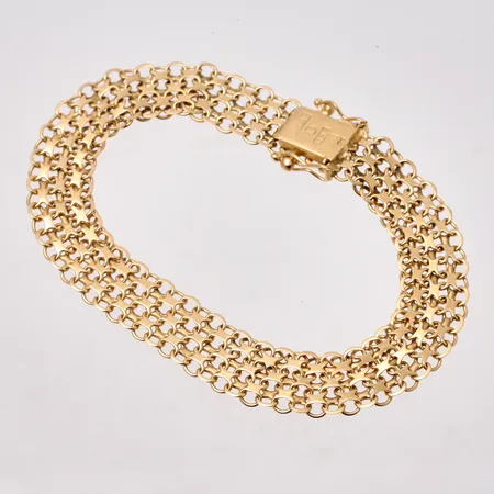 Armband i 18K guld, 19,5cm, X-länk, bredd 10,5mm, tillverkad av Stockholms Ädelsmide Ab, år 1963, vikt 14,4g.