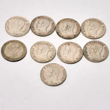 Mynt i silver, 9st 1kronor, vikt 66,62g.