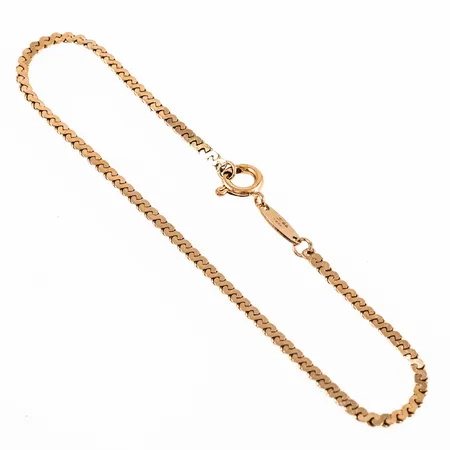 Armband S-länk i 18K guld. Det är 20 cm långt, 2,2 mm brett och väger 3,3g. Springring.