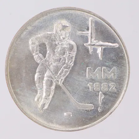 Jubileumsmynt, 50 Markka, Ø35mm, VM i ishockey 1982, Helsingfors-Tammerfors, 500/1000 silver, plastfodral Vikt: 23 g