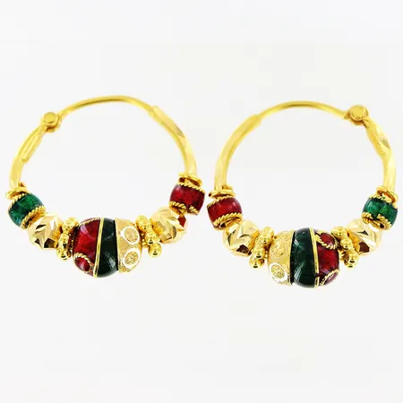 Ett par örhängen, emalj, creoler Ø19mm, bredd 1,5-7mm, 21K. Vikt: 6,1 g