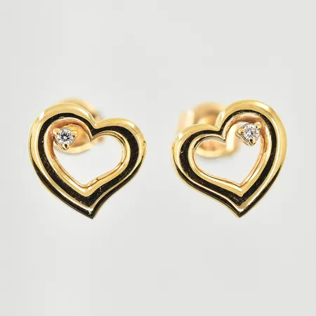 Ett par örhängen hjärtan med vita stenar, stl 10x10 mm, 18K. Vikt: 3,2 g