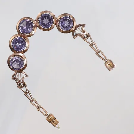 Armband med lila stenar, längd 17,5cm, bredd 5-15mm, 14K, bruttovikt 19,5 Vikt: 19,5 g