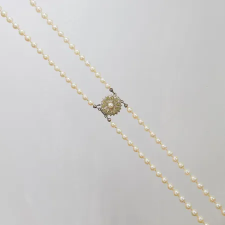 Pärlcollier med odlade saltvattenpärlor, doserat, Ø4,5-7,5mm, dubbelradigt, längd kortaste raden: 51,5mm, lås i silver 835/1000 med odlad pärla samt glasstenar, bruttovikt 41,3g Vikt: 41,3 g