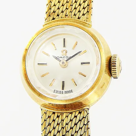 Damur Omega, manuell, integrerad länk, Ø16mm, total längd 18,5cm, 18K i boett och länk, originaletui, bruttovikt: 27,9gram