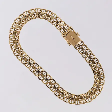 Armband X-länk med stav, längd 19cm, bredd 7,3mm, 18K.  Vikt: 13,9 g
