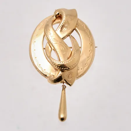 Hänge/Brosch i 18K guld, mått 20,9x60,7mm, vikt 5,56g.