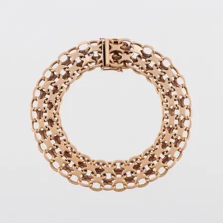 Armband 18k X-länk,stämplad Stockholm,längd ca 21.5 cm,bredd 14.3 mm,bruksslitage. Vikt: 40,1 g