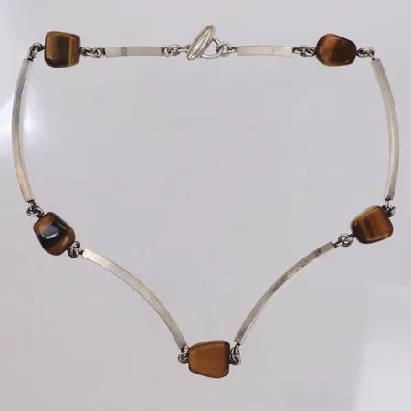 Collier med tigeröga, längd 39cm, bredd 11,7mm, Arvo Saarela, Enköping, år 1963, 830/1000 silver Vikt: 32,6 g
