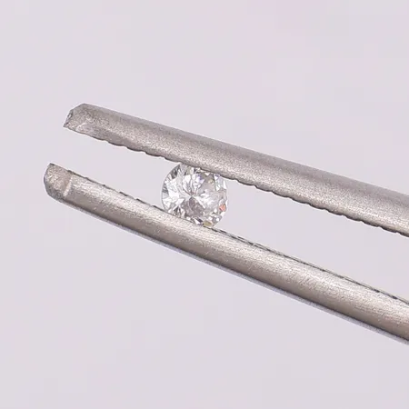 Lös diamant 1 x ca 0,10ct W (H) P, stor nagg Vikt: 0 g