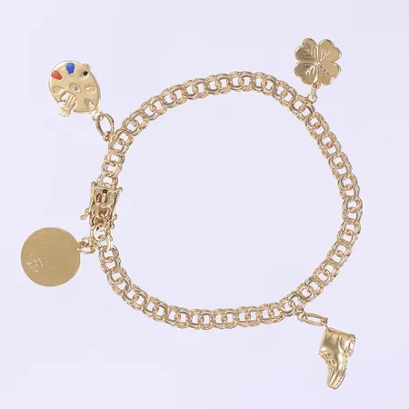 Armband Bismarck med fyra berlocker 19cm bredd 5mm gravyr på en av berlockerna 18K Vikt: 14,1 g