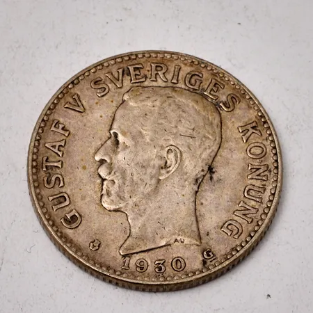 Mynt i silver, 2krona, vikt 14,9g.